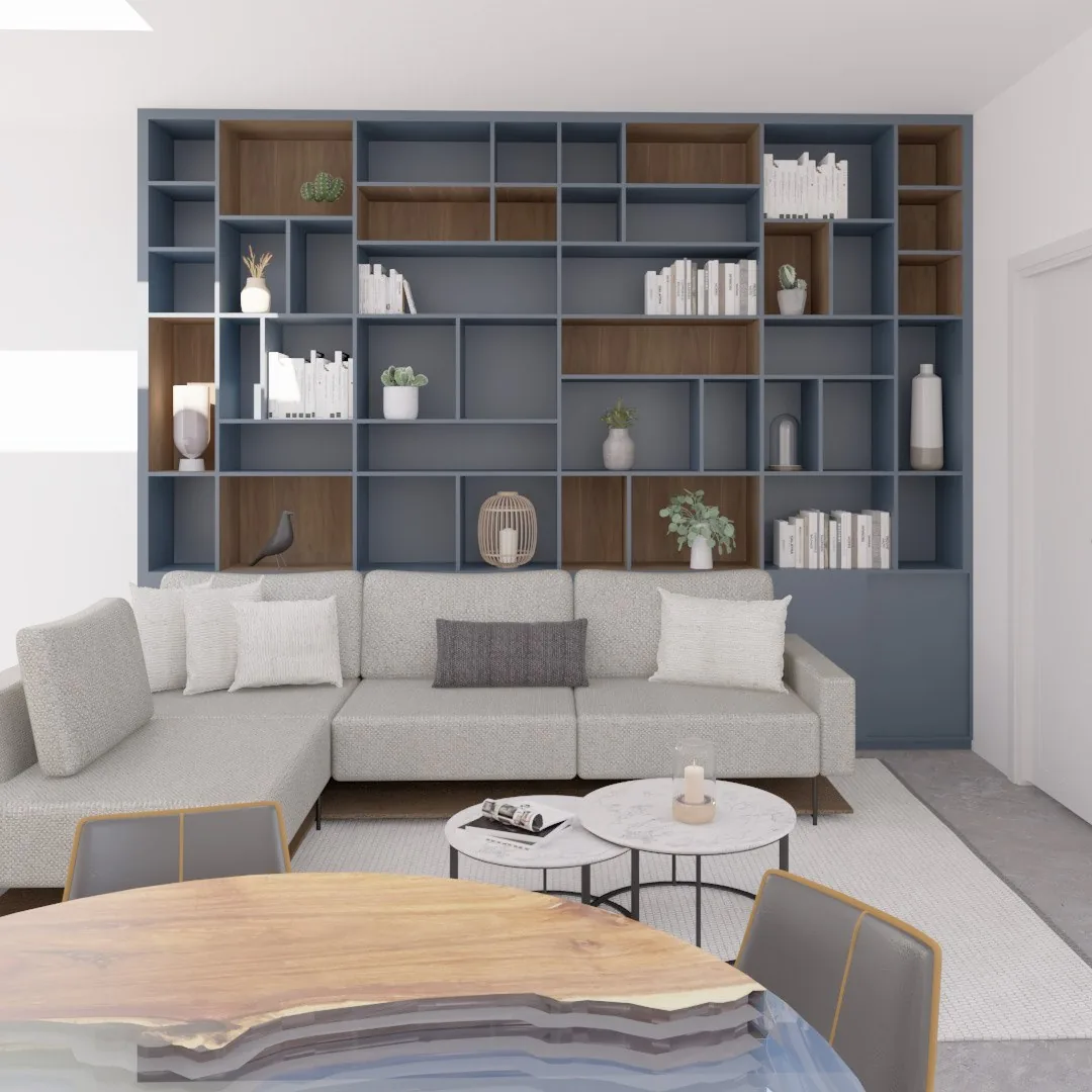 Sala con librero azul de piso a techo y mesa de centro de madera